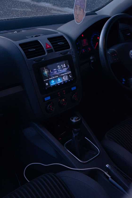 Interior view of the head unit and the gear stick