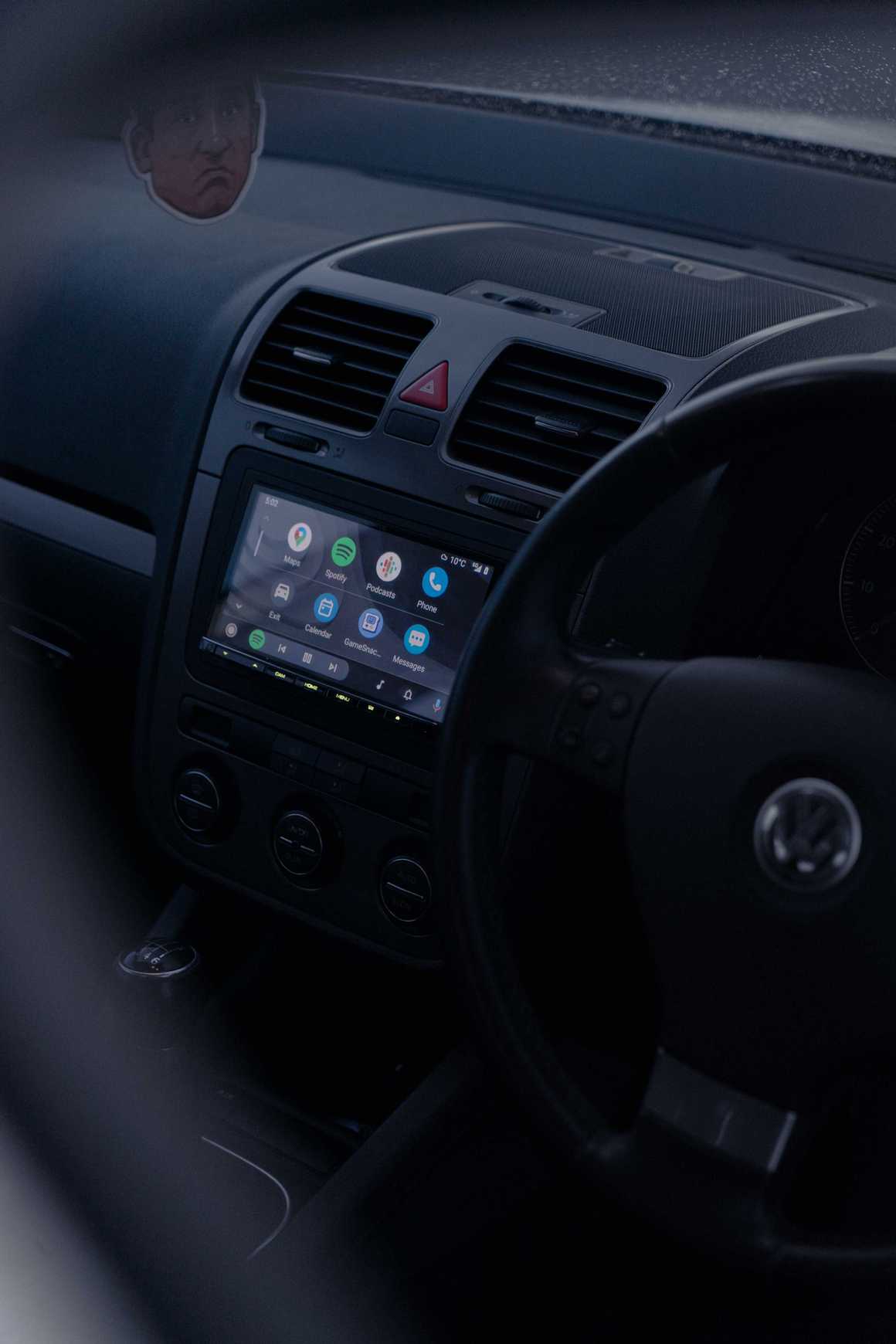 Interior car view of an apple carplay / android auto equipped head unit